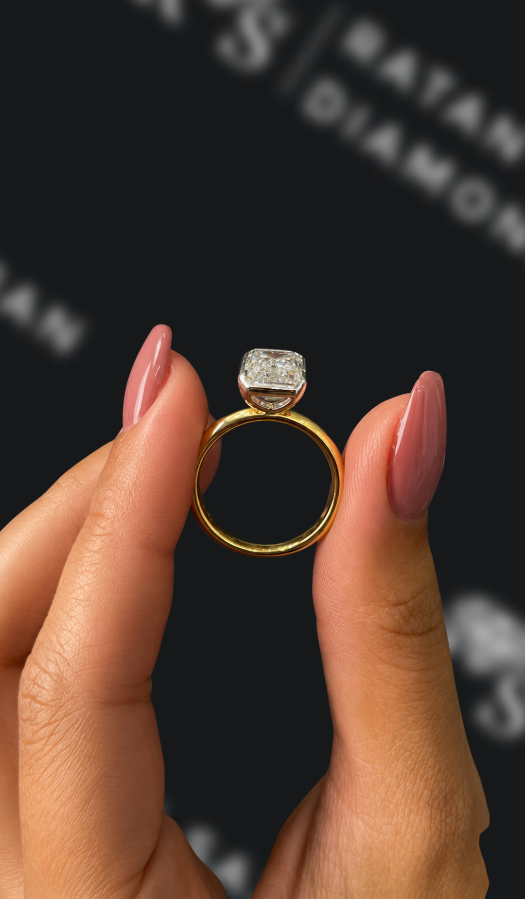 4 carat emerald cut natural diamond engagement ring by Ratan Sajan Diamonds Dubai