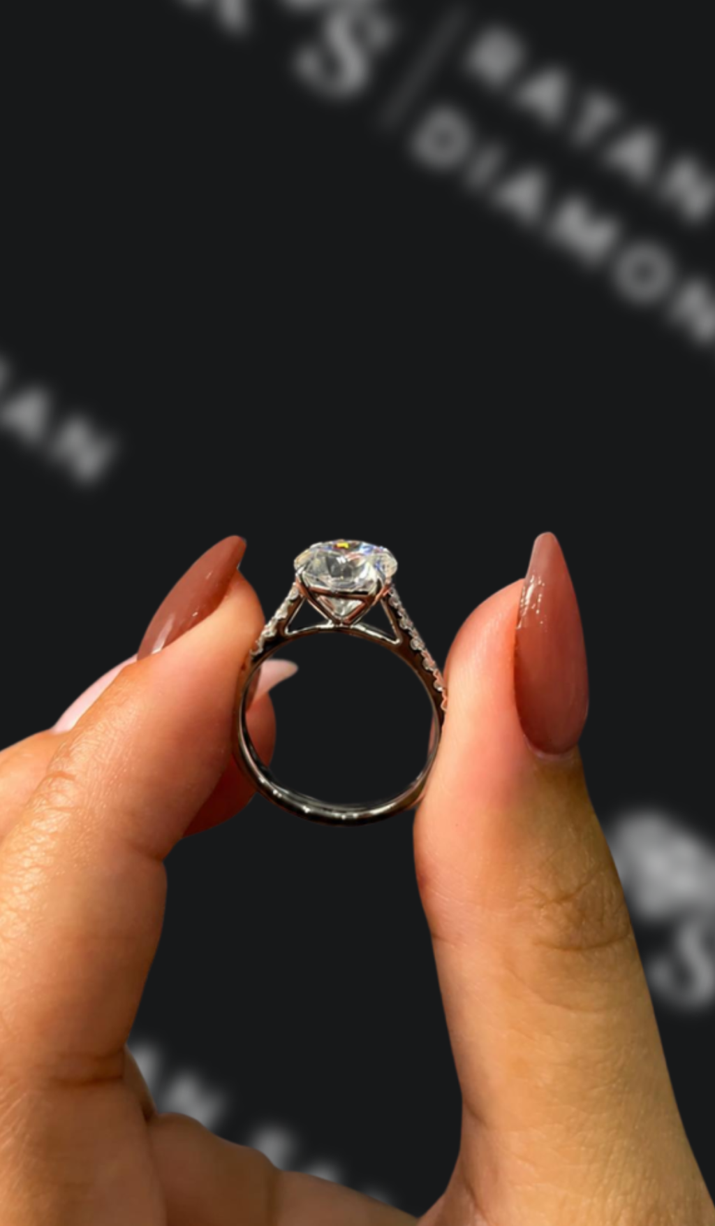 5 carat round brilliant natural diamond engagement ring by Ratan Sajan Diamonds Dubai