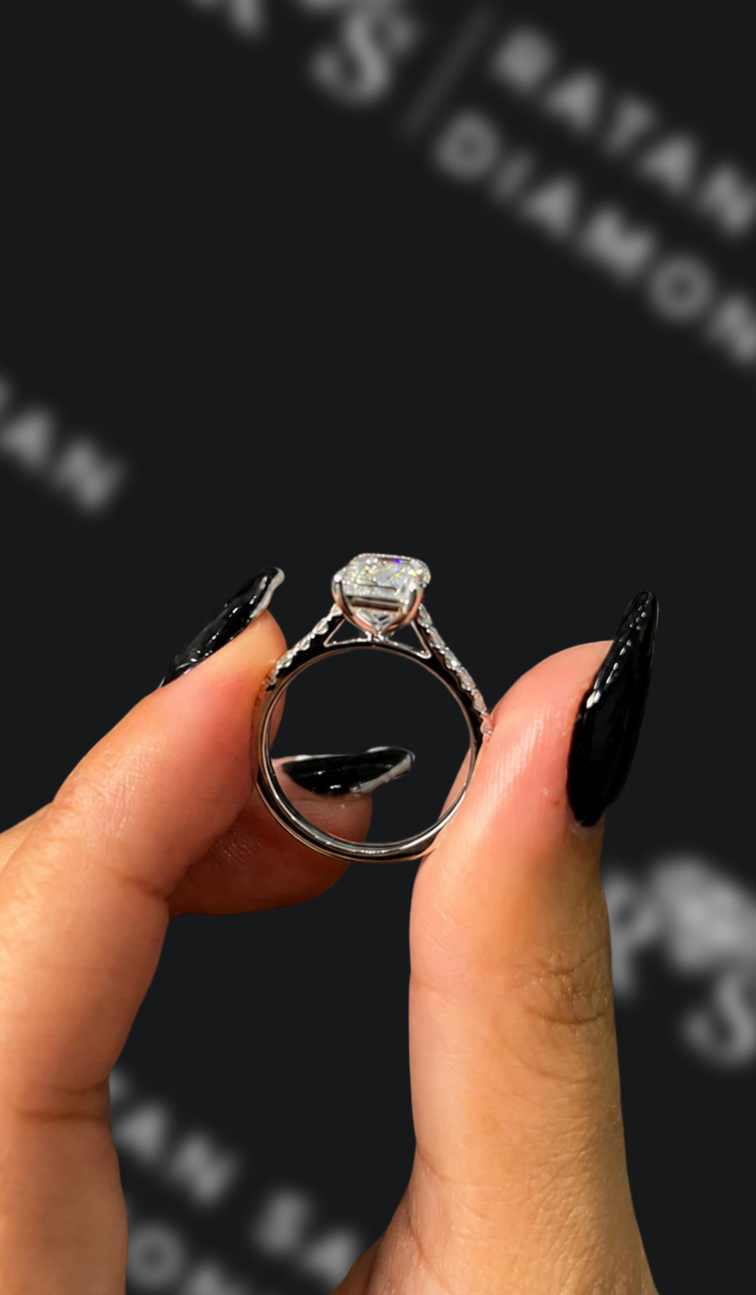 2 carat emerald cut natural diamond engagement ring by Ratan Sajan Diamonds Dubai