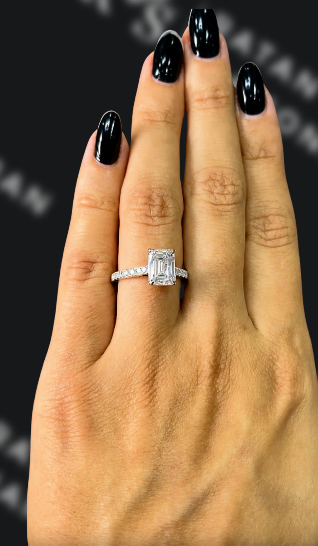 2 carat emerald cut natural diamond engagement ring by Ratan Sajan Diamonds Dubai