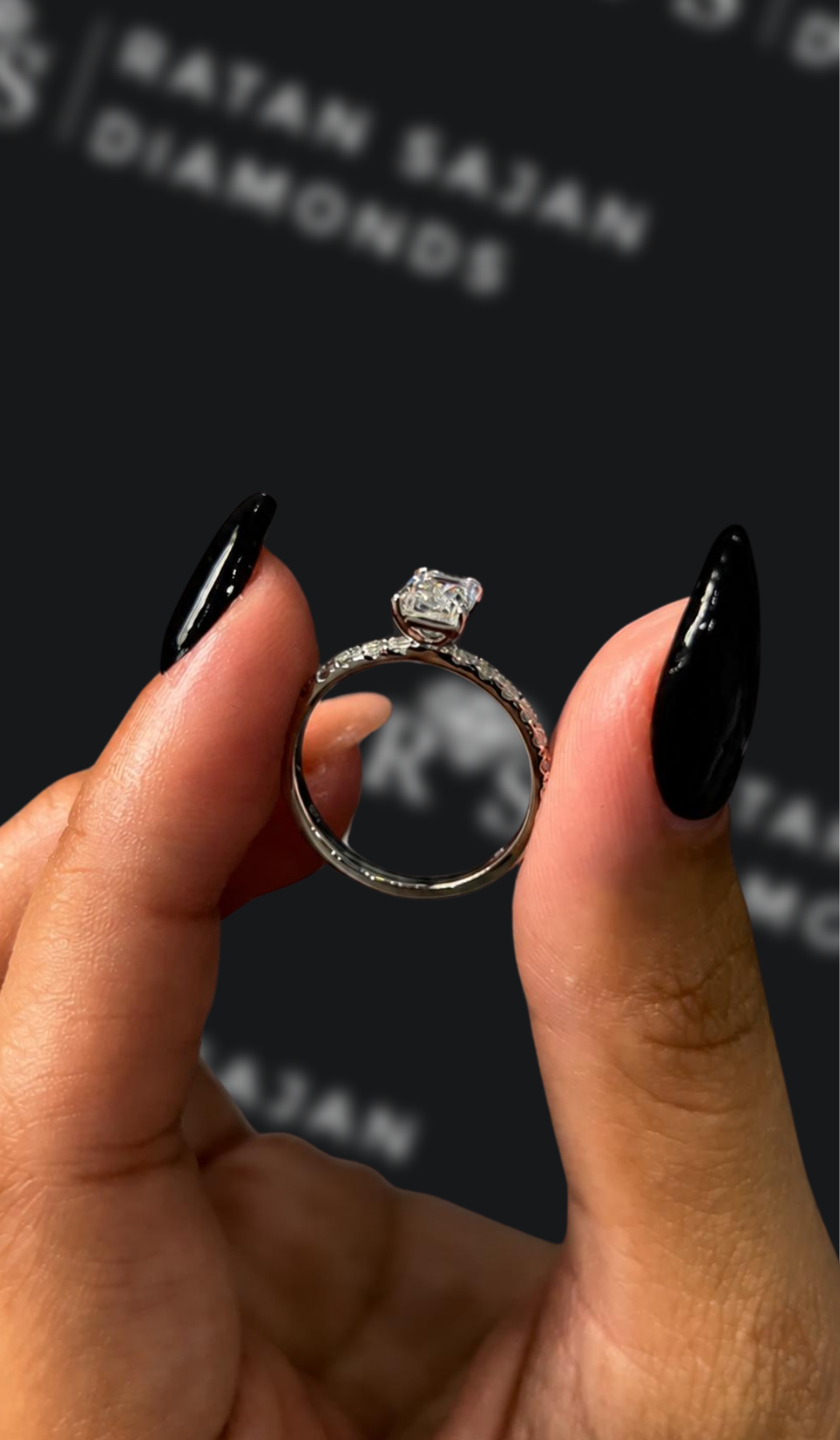 1 carat emerald cut natural diamond engagement ring by Ratan Sajan Diamonds Dubai