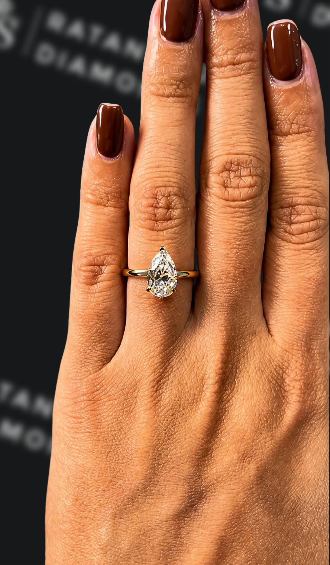 2 carat pear shaped natural diamond engagement ring by Ratan Sajan Diamonds Dubai