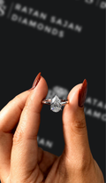 1.5 carat pear shaped natural diamond engagement ring by Ratan Sajan Diamonds Dubai