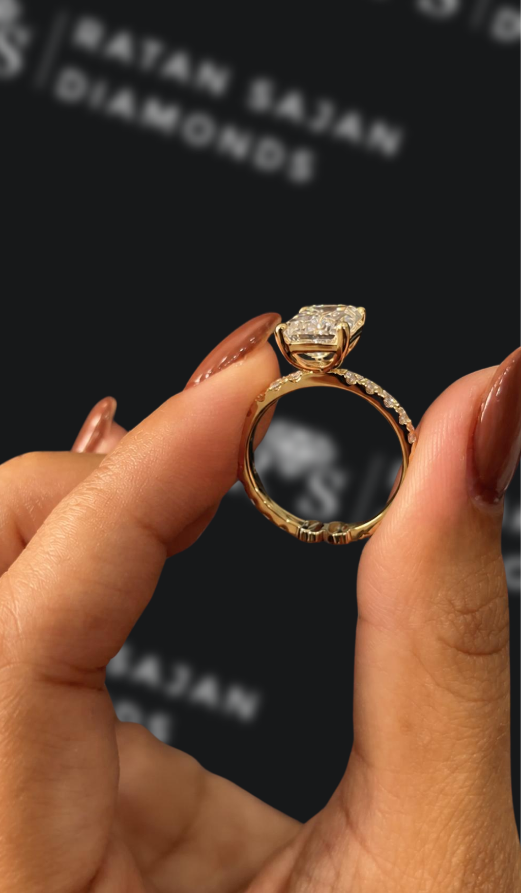 2.5 carat emerald cut natural diamond engagement ring by Ratan Sajan Diamonds Dubai