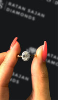 0.5 carat oval natural diamond engagement ring by Ratan Sajan Diamonds Dubai