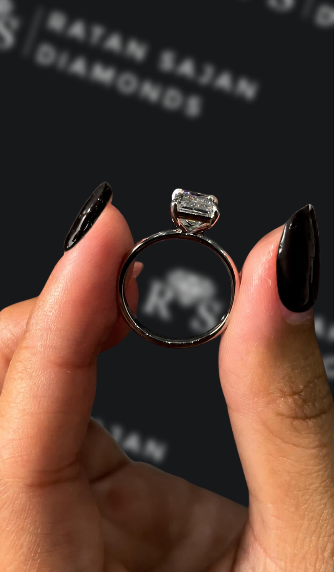 2 carat emerald cut natural diamond engagement ring by Ratan Sajan Diamonds Dubai