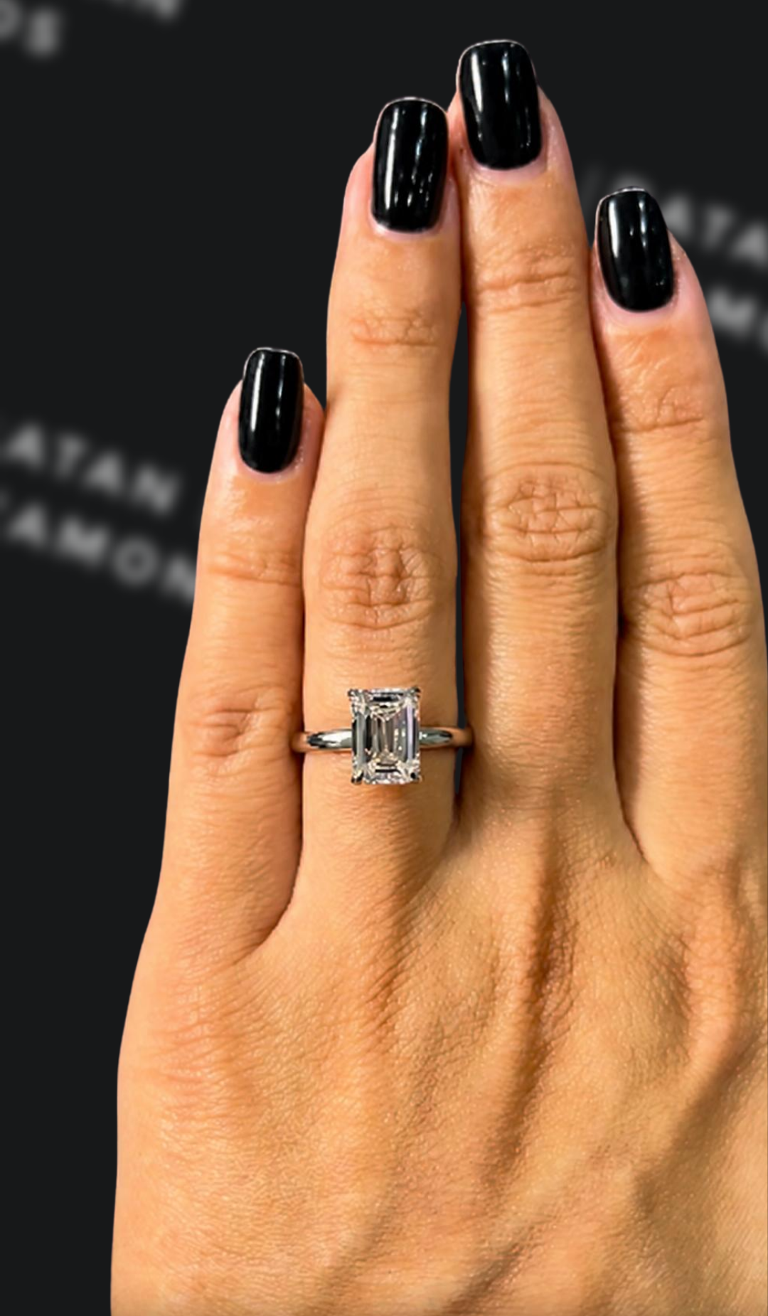 2 carat emerald cut natural diamond engagement ring by Ratan Sajan Diamonds Dubai