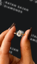 1 carat pear shaped natural diamond engagement ring by Ratan Sajan Diamonds Dubai