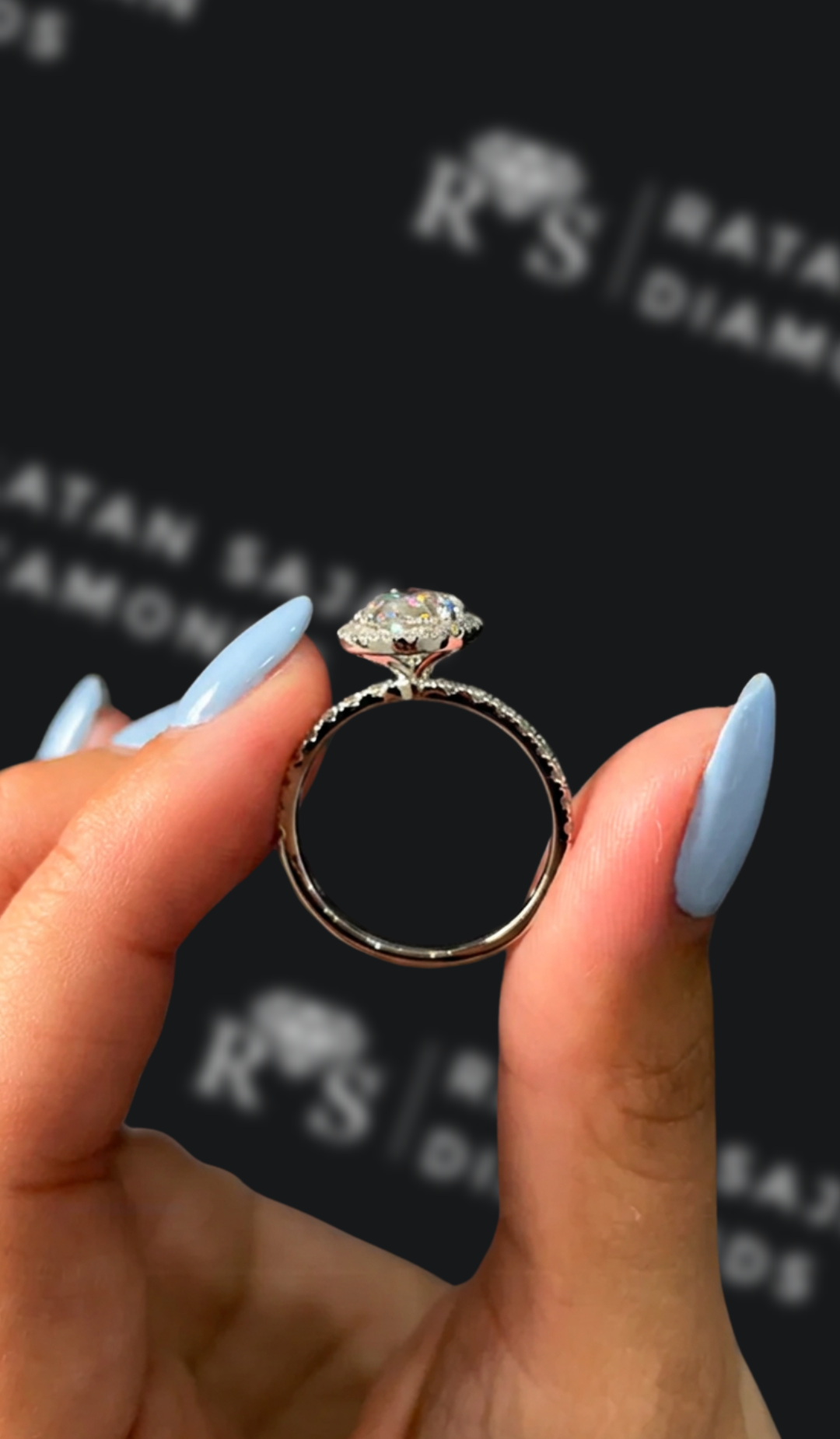 2 carat oval natural diamond engagement ring by Ratan Sajan Diamonds Dubai