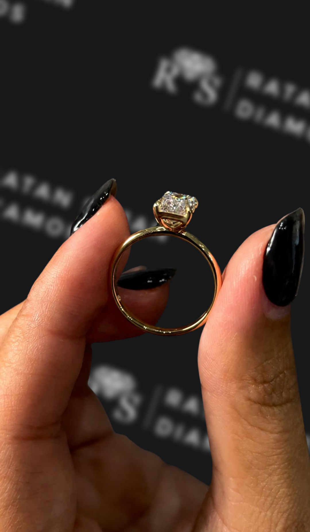 1.5 carat emerald cut natural diamond engagement ring by Ratan Sajan Diamonds Dubai