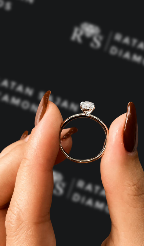 0.5 carat pear shaped natural diamond engagement ring by Ratan Sajan Diamonds Dubai