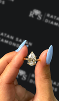 2.5 carat pear shaped natural diamond engagement ring by Ratan Sajan Diamonds Dubai