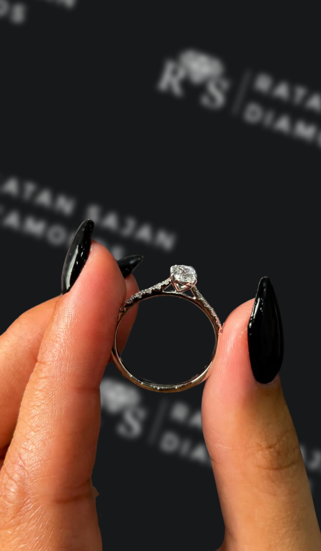 0.5 carat oval natural diamond engagement ring by Ratan Sajan Diamonds Dubai