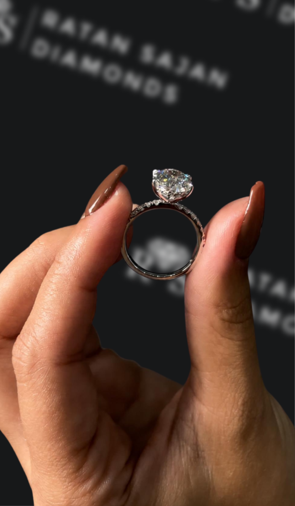 2.5 carat oval natural diamond engagement ring by Ratan Sajan Diamonds Dubai