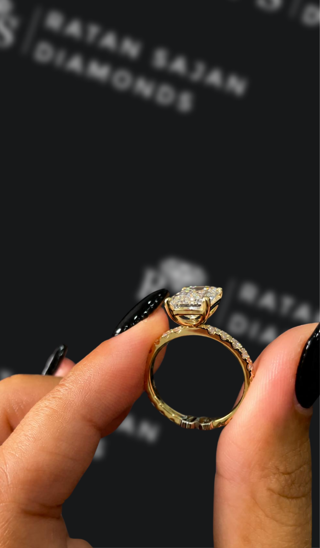 2.5 carat emerald cut natural diamond engagement ring by Ratan Sajan Diamonds Dubai
