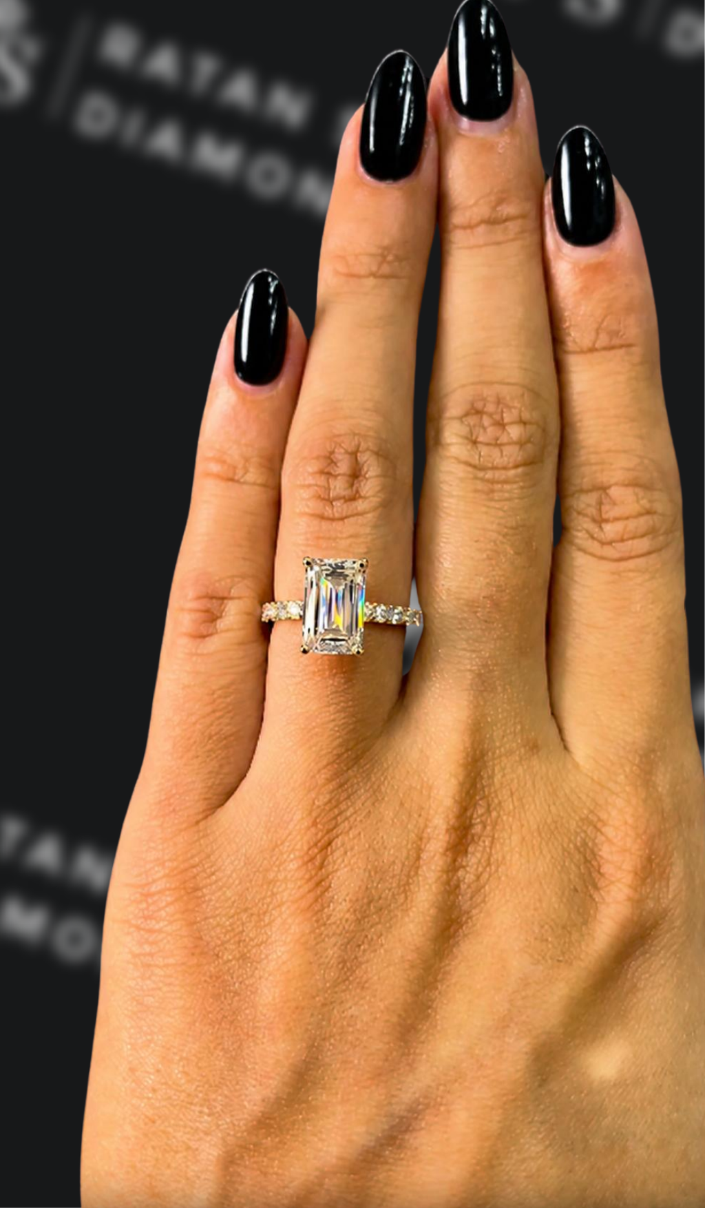 2.5 carat emerald cut natural diamond engagement ring by Ratan Sajan Diamonds Dubai