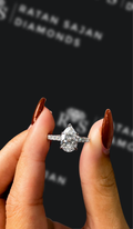 1.5 carat pear shaped natural diamond engagement ring by Ratan Sajan Diamonds Dubai
