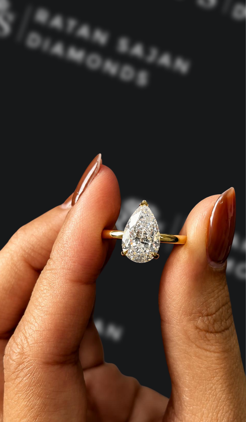 2 carat pear shaped natural diamond engagement ring by Ratan Sajan Diamonds Dubai