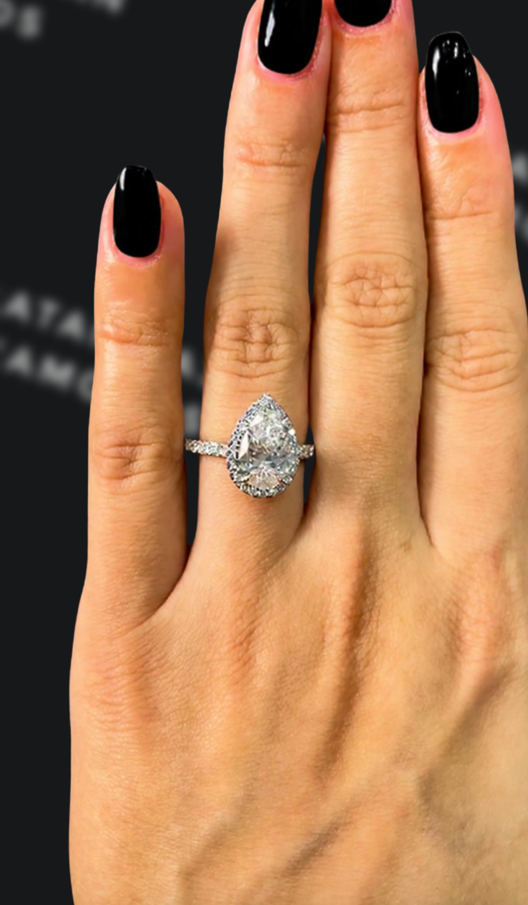 2 carat pear shaped natural diamond engagement ring by Ratan Sajan Diamonds Dubai