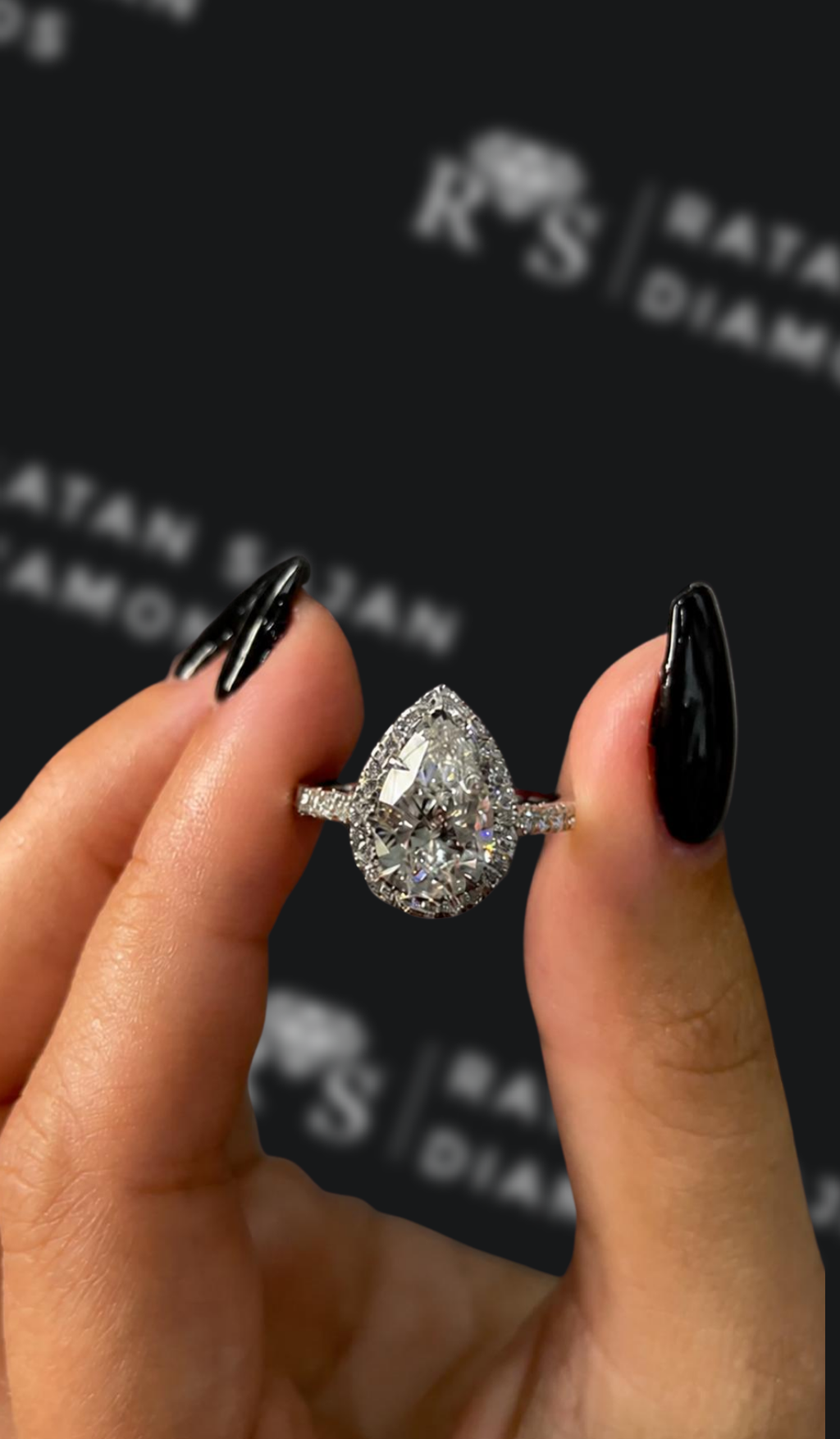 2 carat pear shaped natural diamond engagement ring by Ratan Sajan Diamonds Dubai