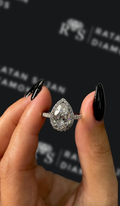 2 carat pear shaped natural diamond engagement ring by Ratan Sajan Diamonds Dubai
