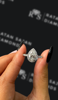 1.5 carat pear shaped natural diamond engagement ring by Ratan Sajan Diamonds Dubai