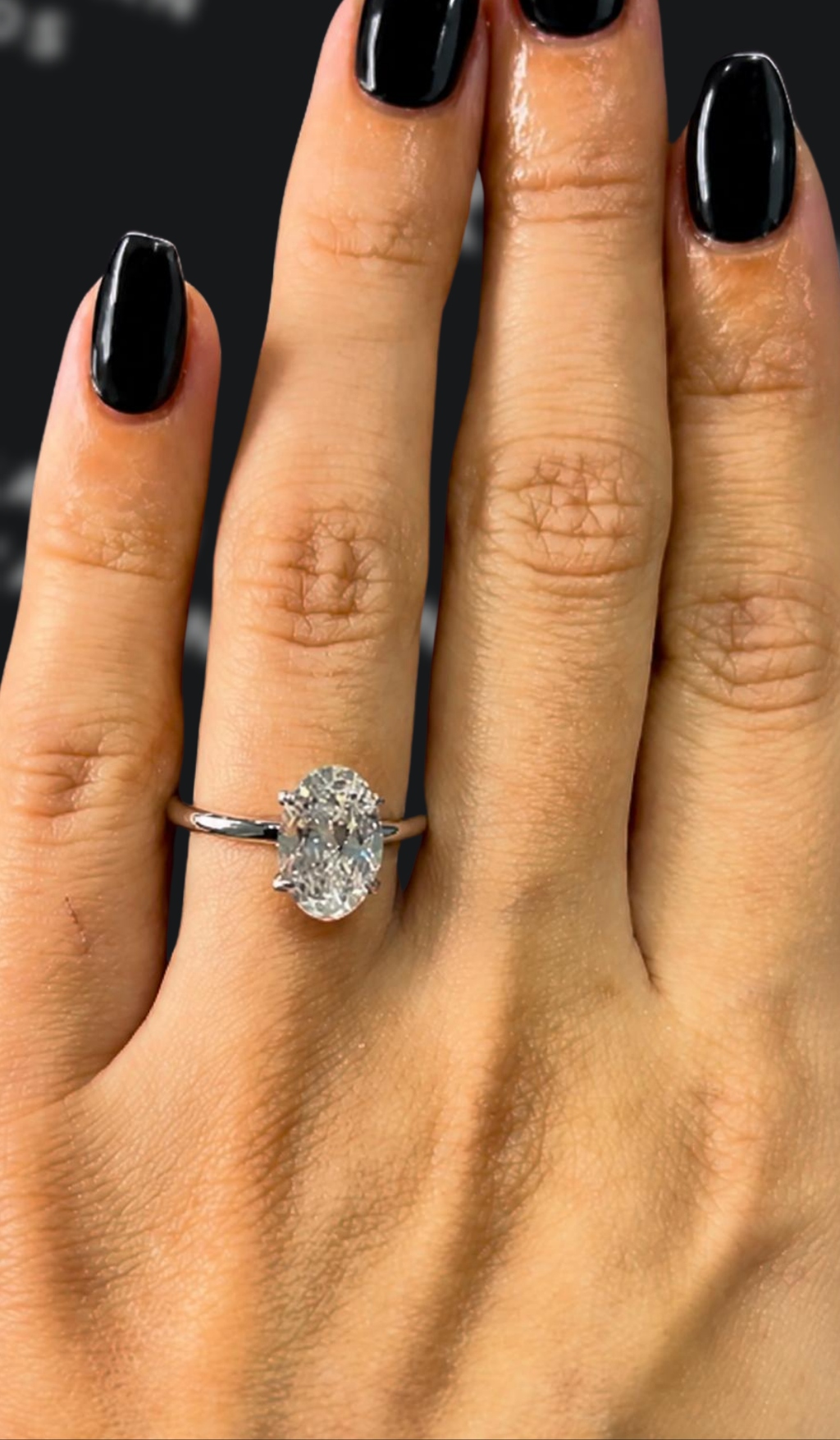 2 carat oval natural diamond engagement ring by Ratan Sajan Diamonds Dubai