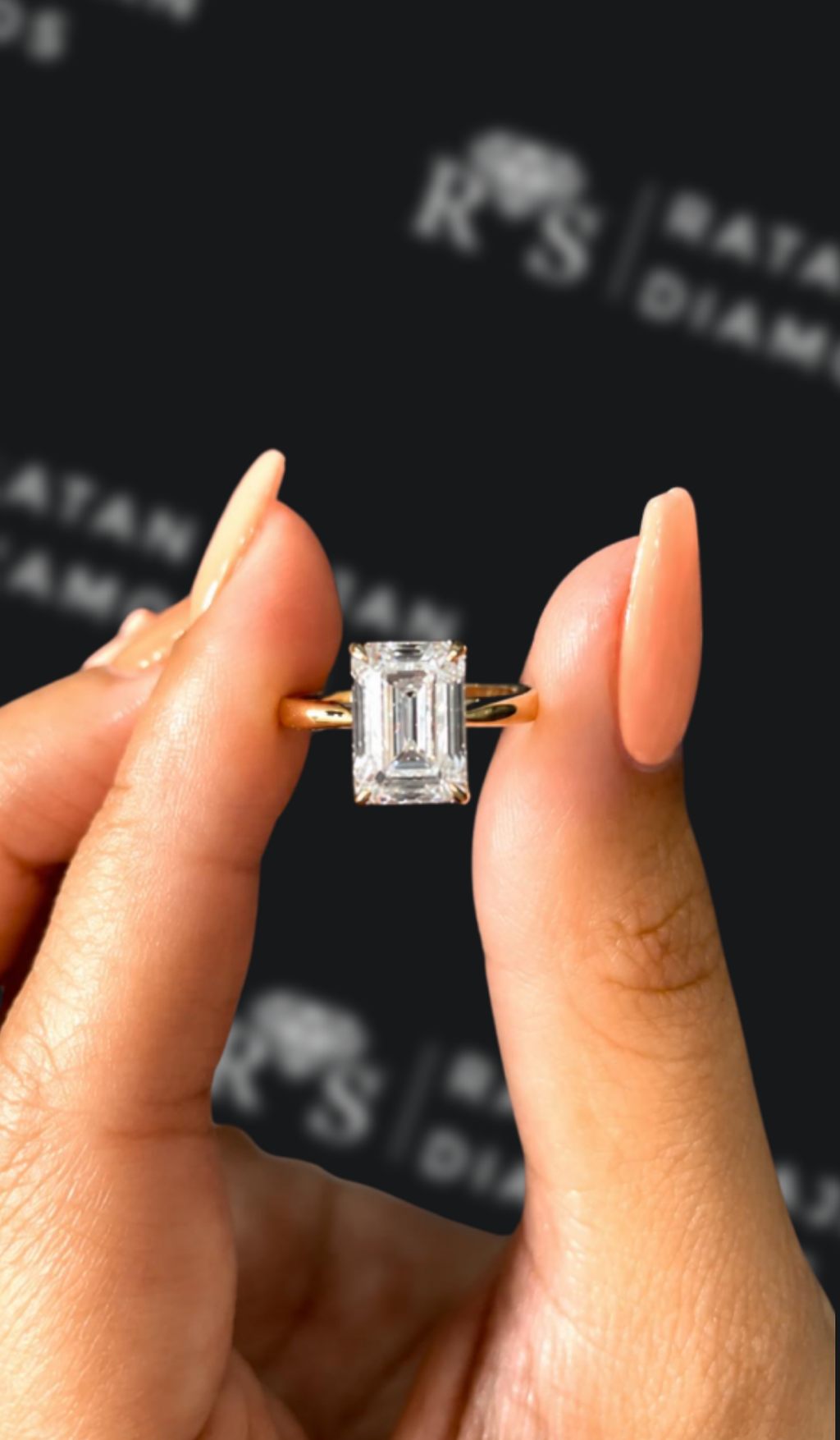 2.5 carat emerald cut natural diamond engagement ring by Ratan Sajan Diamonds Dubai