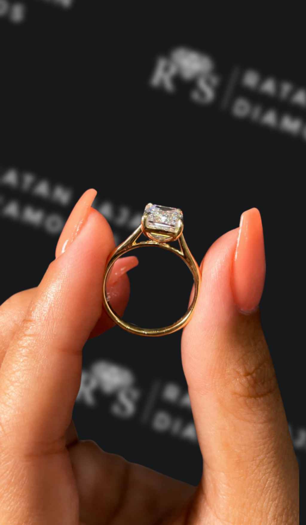 2.5 carat emerald cut natural diamond engagement ring by Ratan Sajan Diamonds Dubai