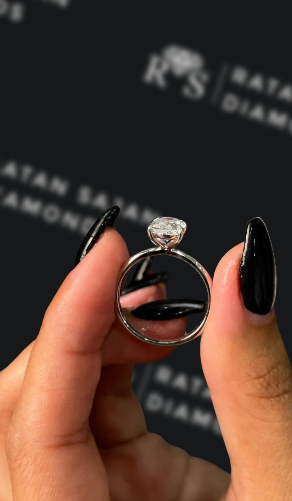 1.5 carat oval natural diamond engagement ring by Ratan Sajan Diamonds Dubai