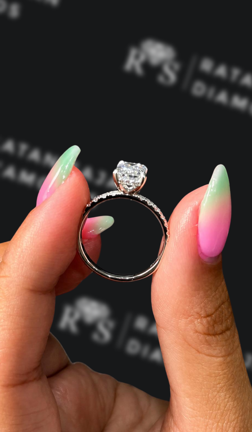 1.5 carat emerald cut natural diamond engagement ring by Ratan Sajan Diamonds Dubai