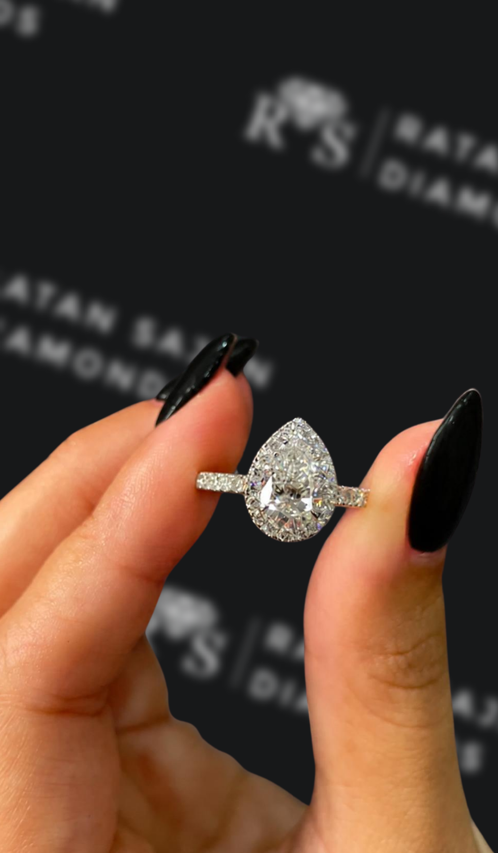 1 carat pear shaped natural diamond engagement ring by Ratan Sajan Diamonds Dubai