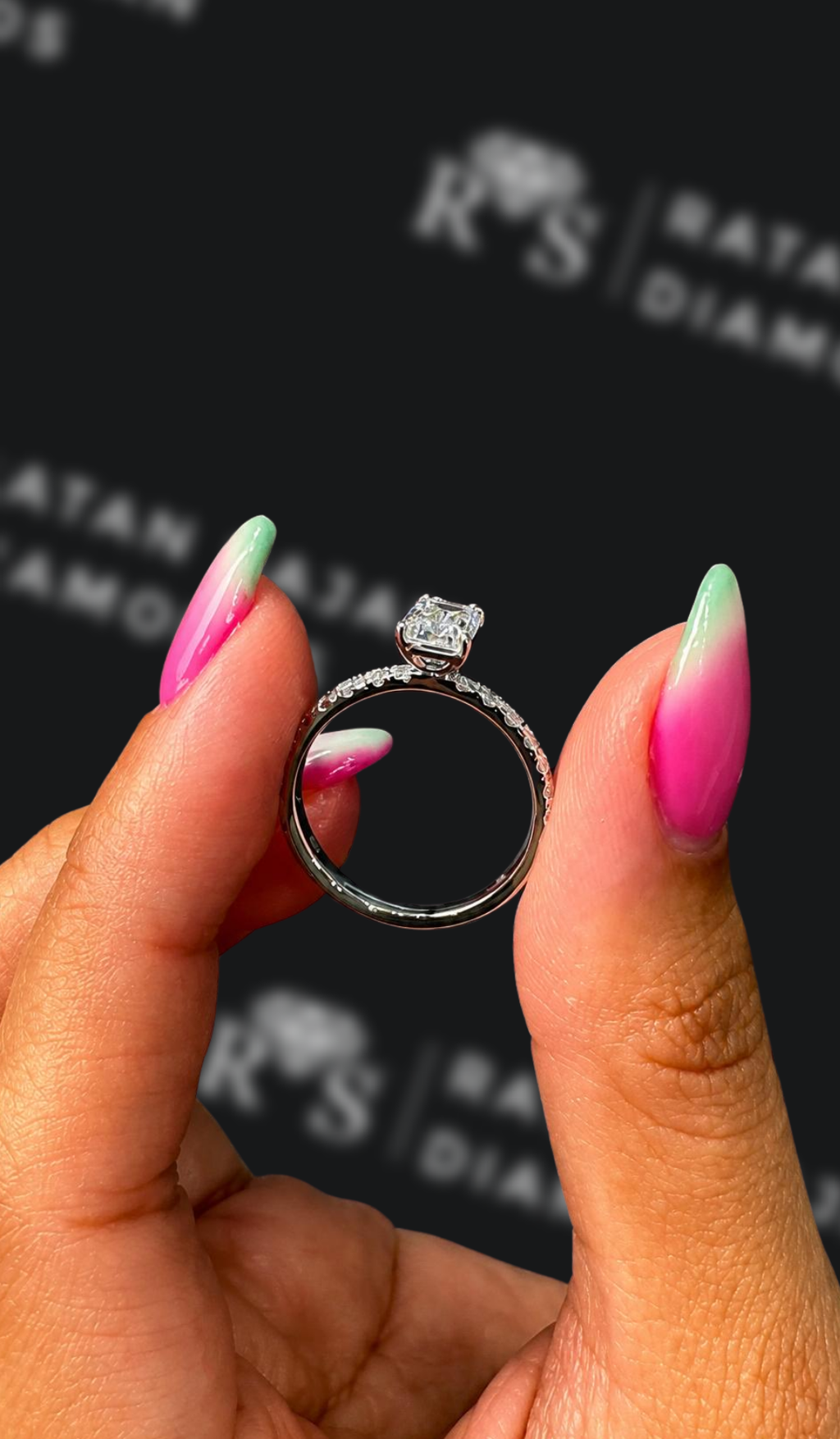 1 carat emerald cut natural diamond engagement ring by Ratan Sajan Diamonds Dubai