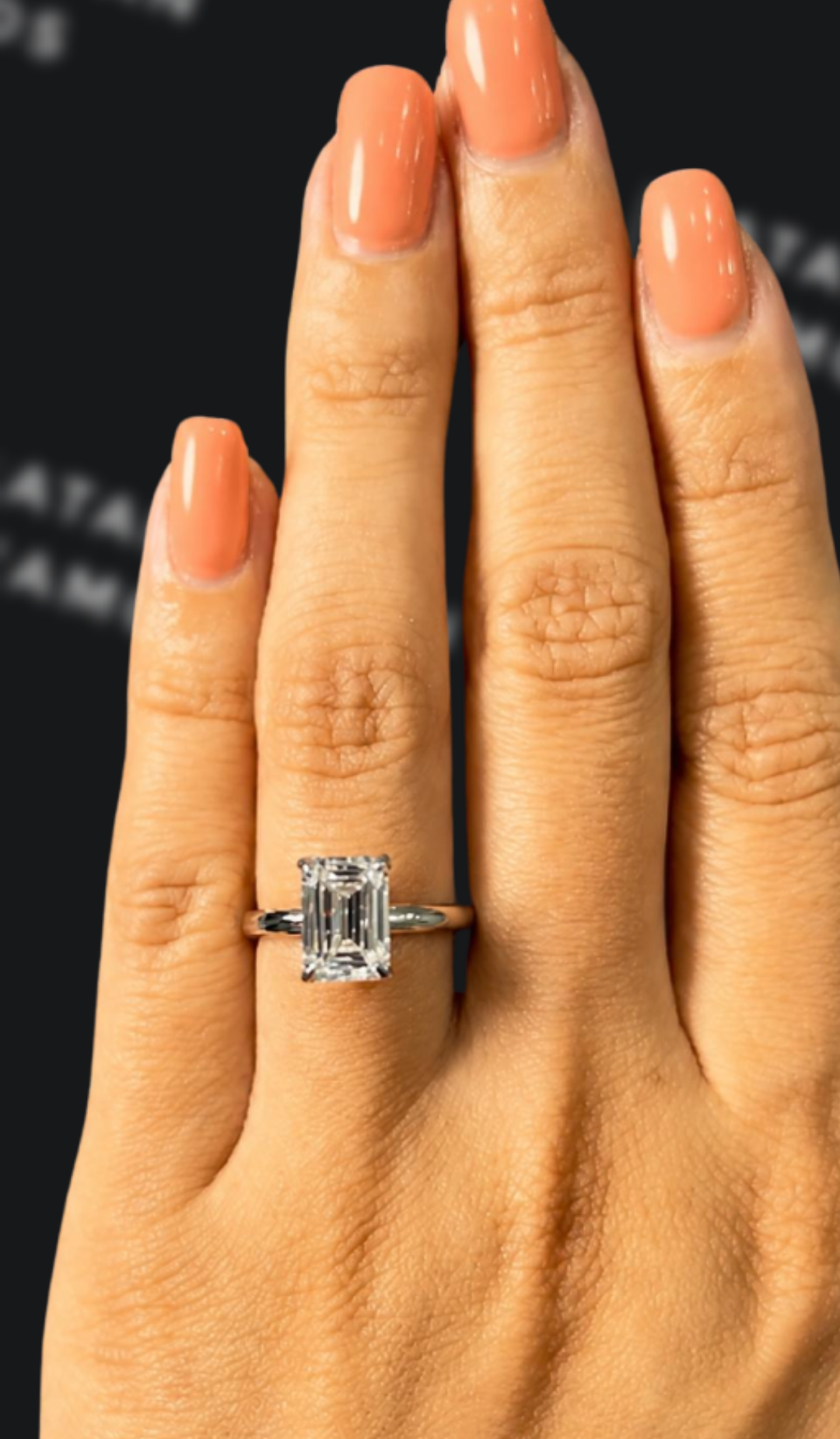 2 carat emerald cut natural diamond engagement ring by Ratan Sajan Diamonds Dubai