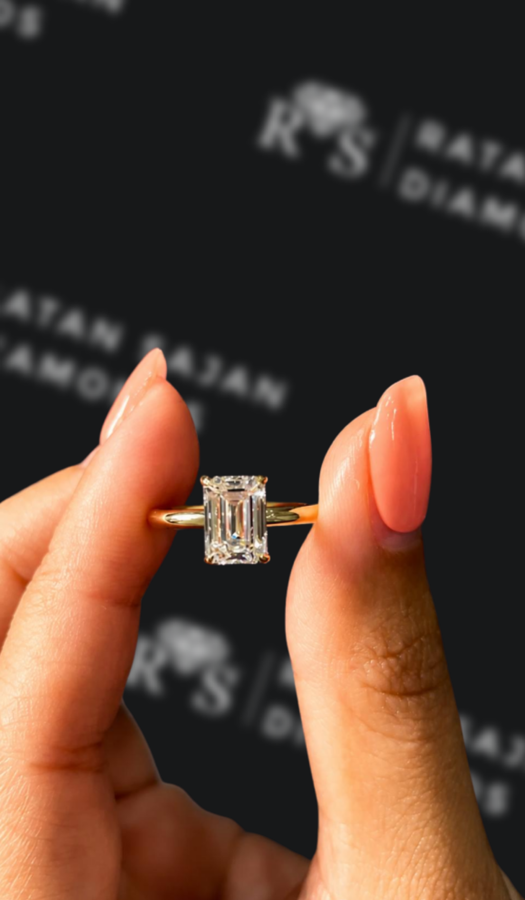 1.5 carat emerald cut natural diamond engagement ring by Ratan Sajan Diamonds Dubai