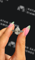 2 carat pear shaped natural diamond engagement ring by Ratan Sajan Diamonds Dubai