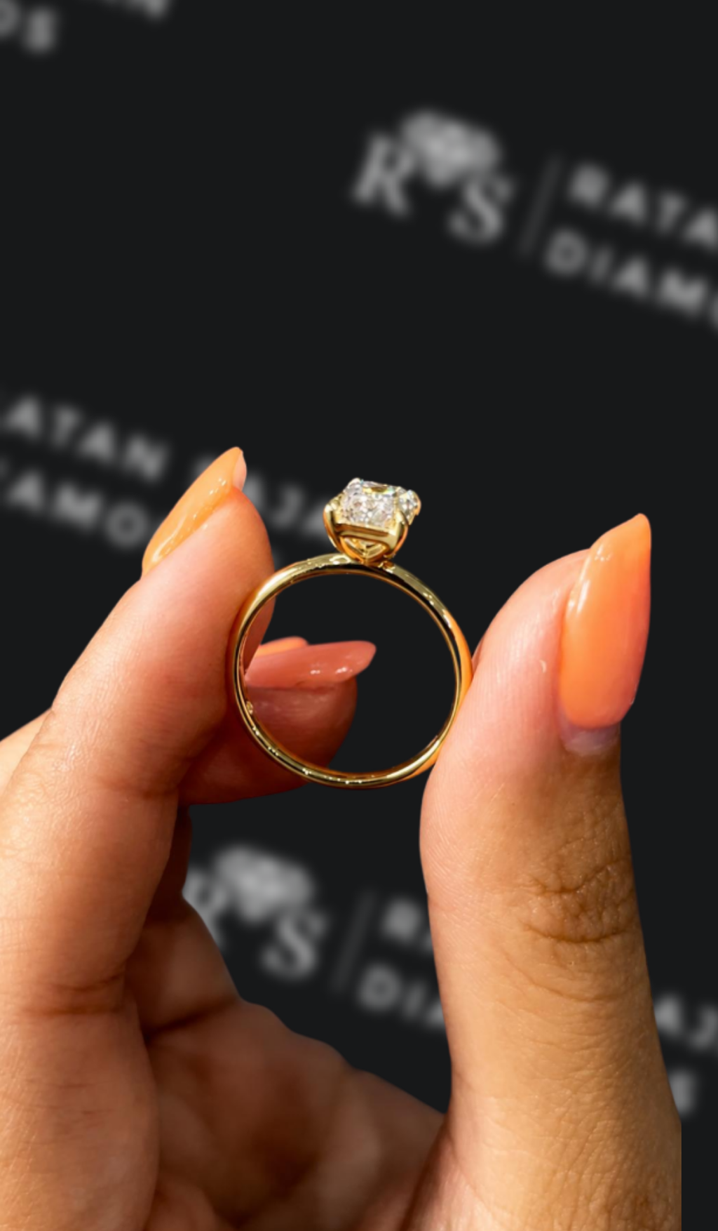 1.5 carat emerald cut natural diamond engagement ring by Ratan Sajan Diamonds Dubai