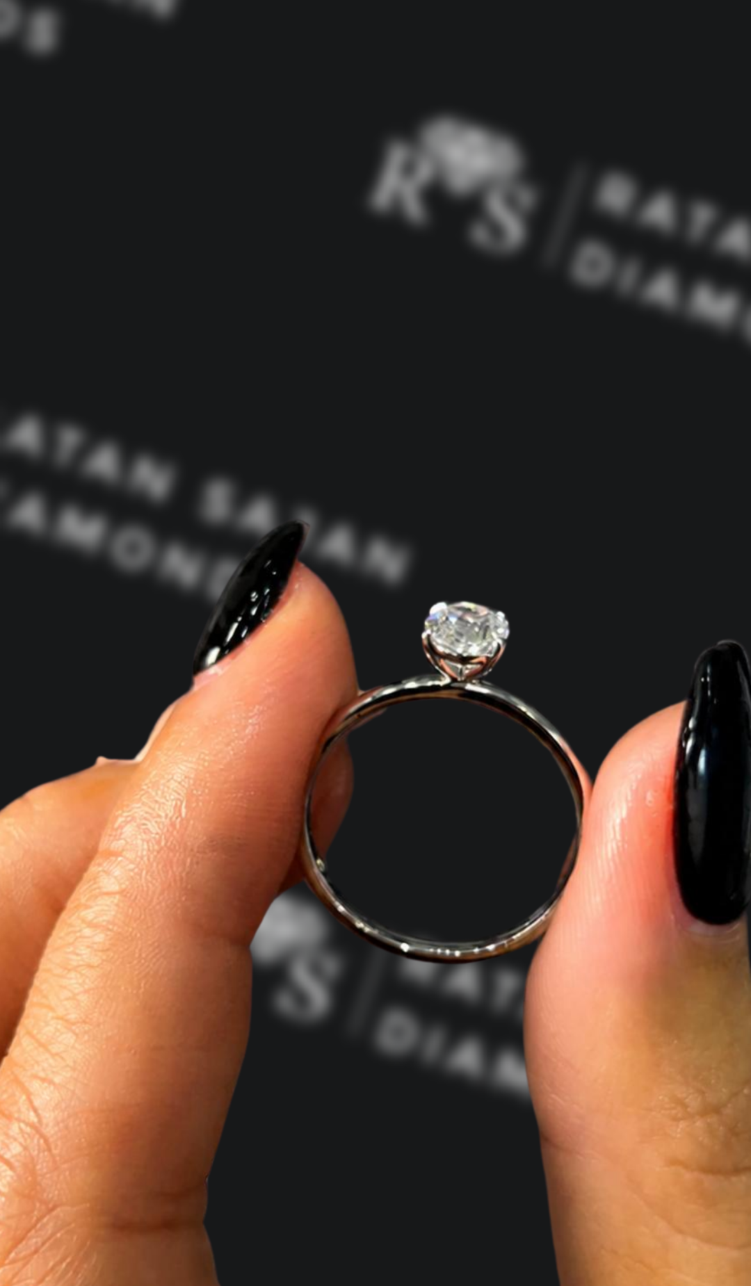 0.5 carat oval natural diamond engagement ring by Ratan Sajan Diamonds Dubai