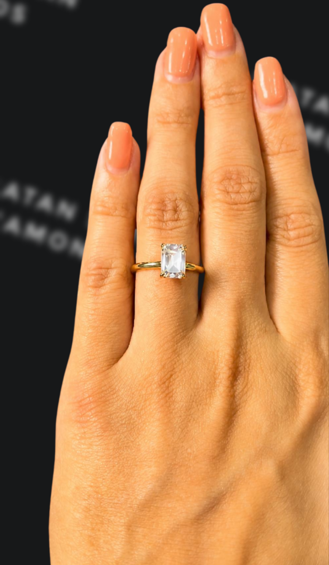 1.5 carat emerald cut natural diamond engagement ring by Ratan Sajan Diamonds Dubai