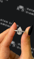 2 carat pear shaped natural diamond engagement ring by Ratan Sajan Diamonds Dubai