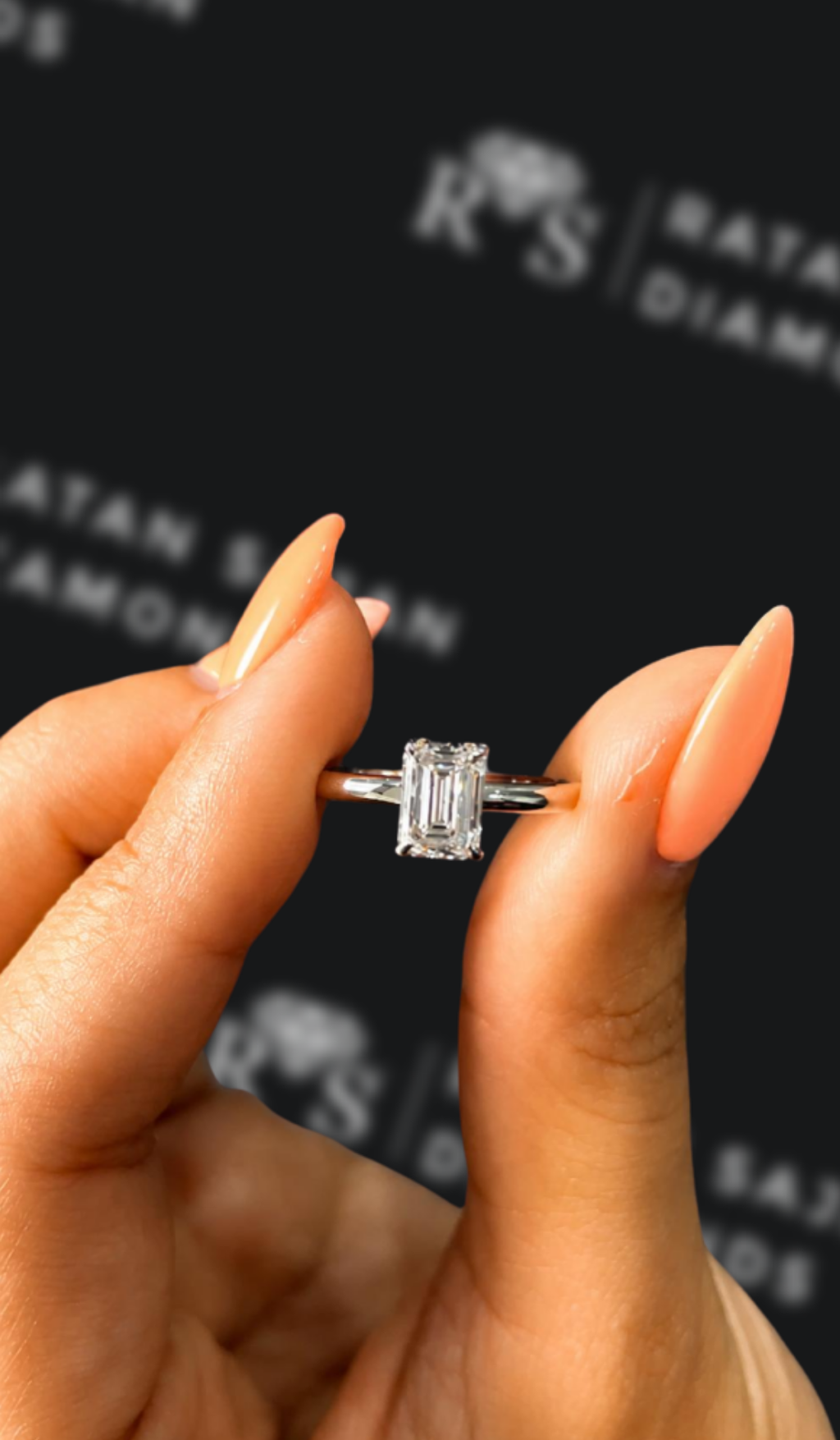 1 carat emerald cut natural diamond engagement ring by Ratan Sajan Diamonds Dubai