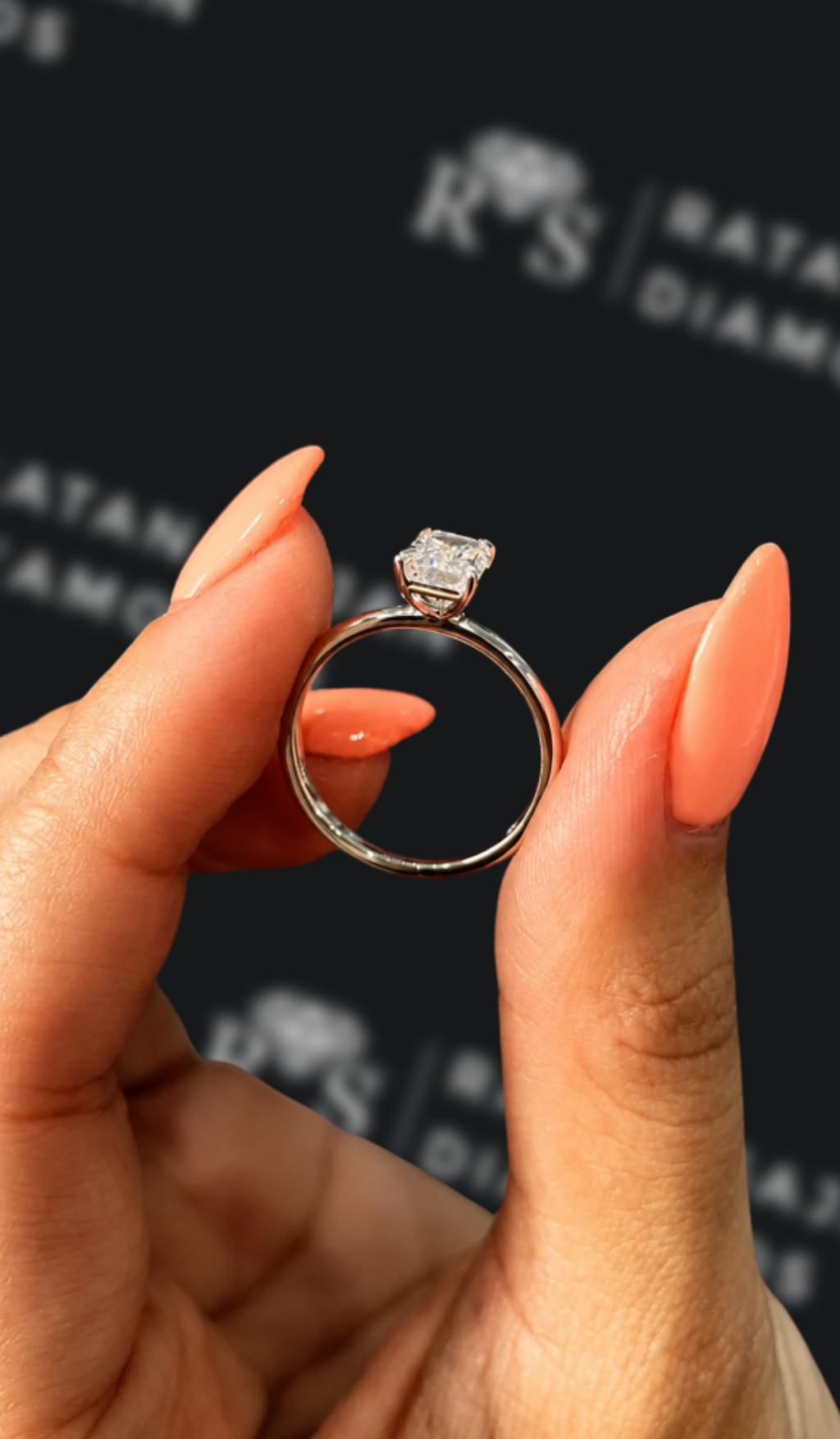 1 carat emerald cut natural diamond engagement ring by Ratan Sajan Diamonds Dubai