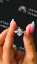 1.5 carat pear shaped natural diamond engagement ring by Ratan Sajan Diamonds Dubai