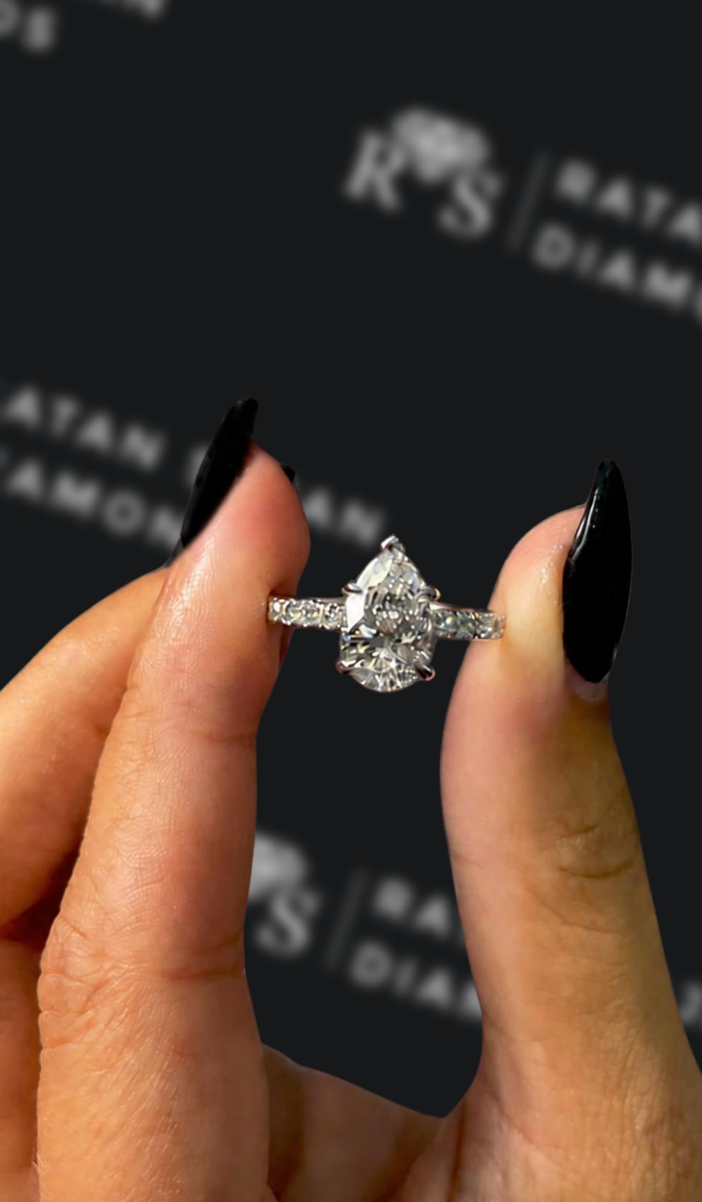 1.5 carat pear shaped natural diamond engagement ring by Ratan Sajan Diamonds Dubai