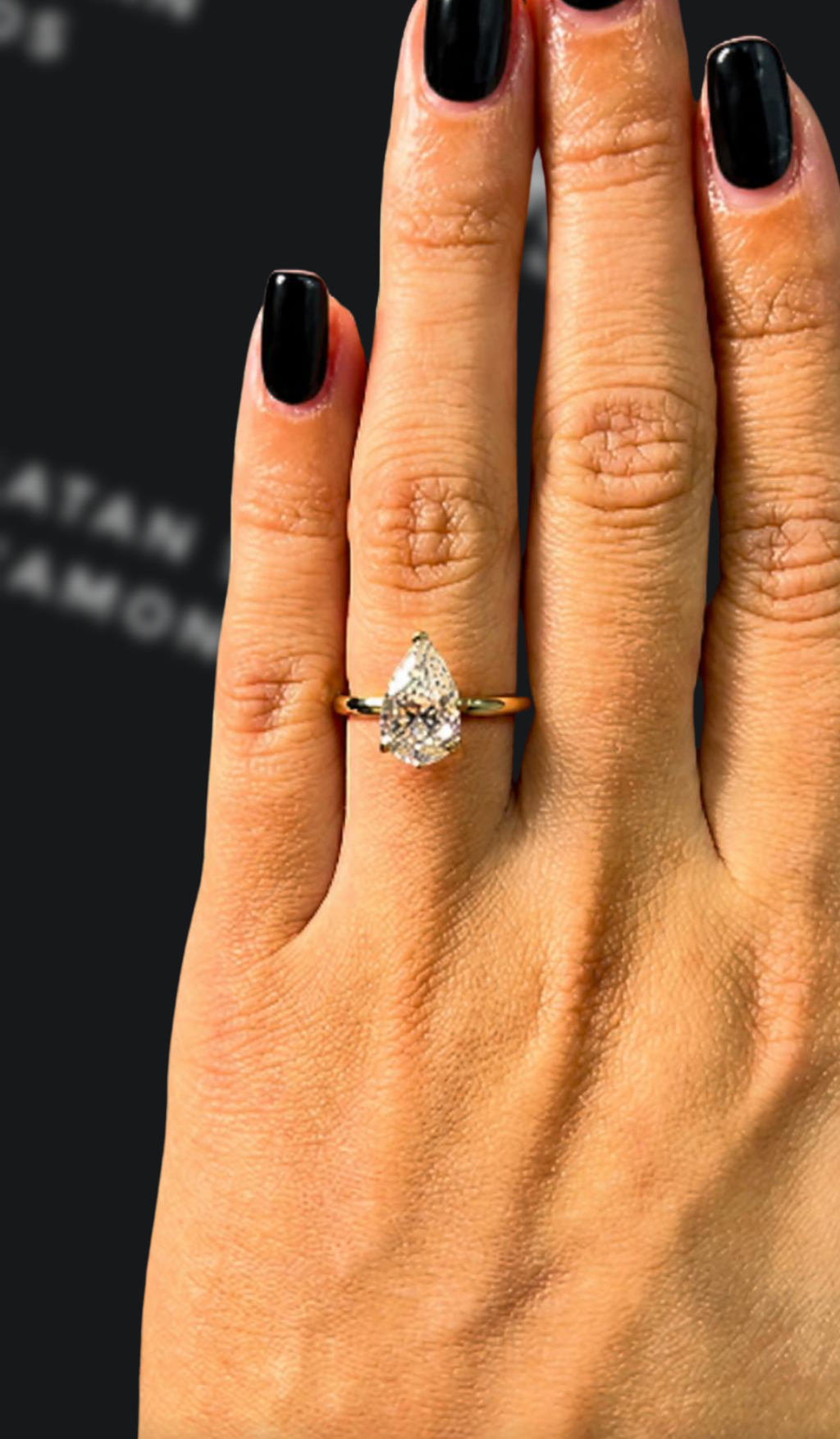 2 carat pear shaped natural diamond engagement ring by Ratan Sajan Diamonds Dubai